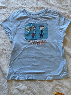 Light Blue Graphic Tee with Sparkler Design